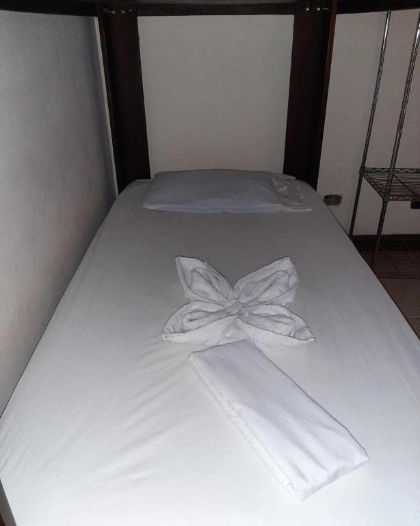 Postel nebo postele na pokoji v ubytování Cabinas surf Arribadas