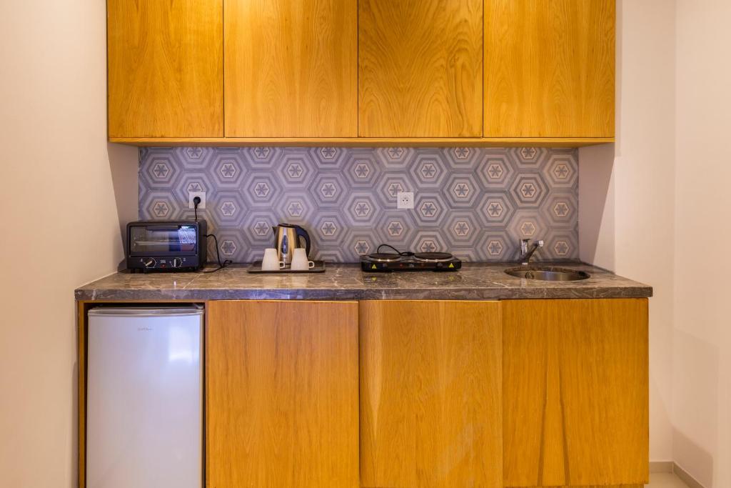 Kuchyň nebo kuchyňský kout v ubytování AppartHotel Atrani