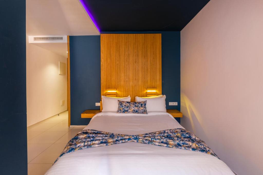 Postel nebo postele na pokoji v ubytování AppartHotel Atrani