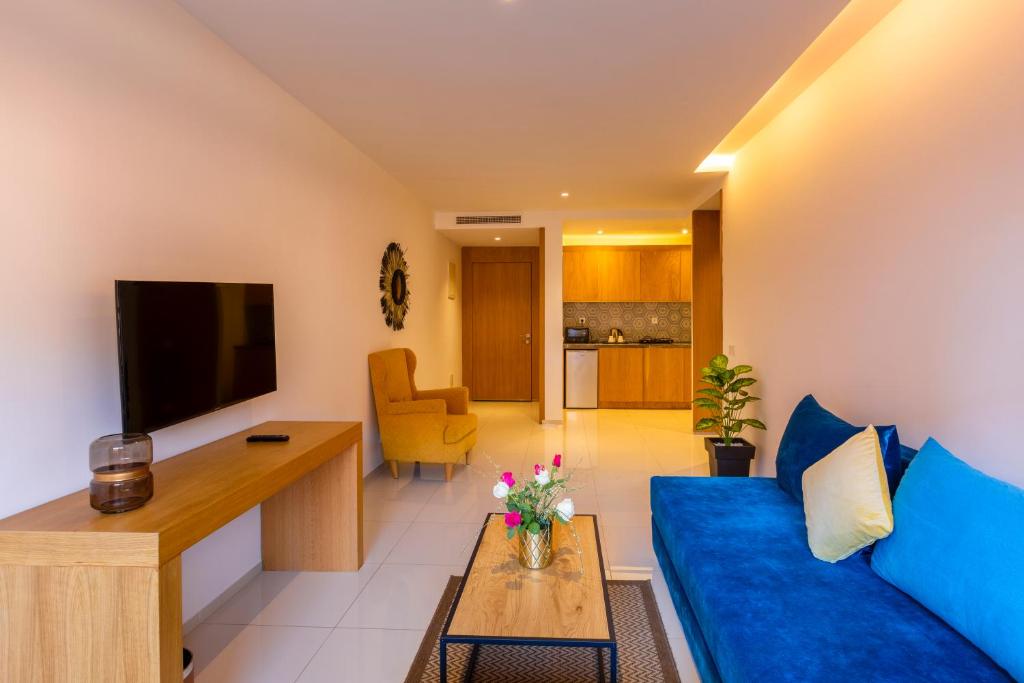 TV a/nebo společenská místnost v ubytování AppartHotel Atrani