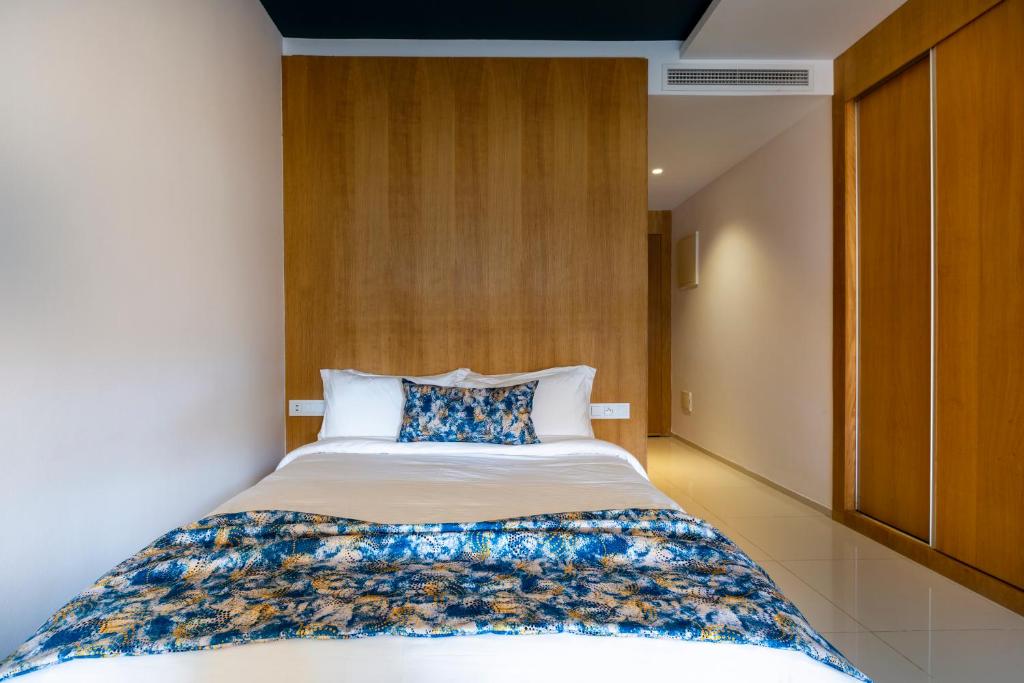 Postel nebo postele na pokoji v ubytování AppartHotel Atrani