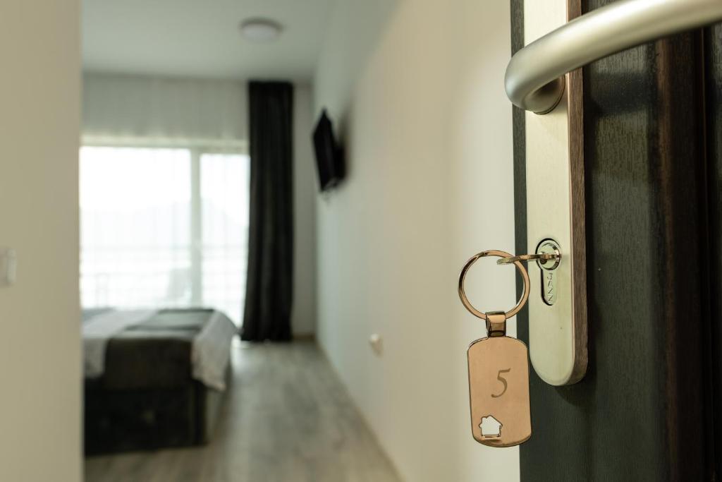 Postel nebo postele na pokoji v ubytování Casa BeaSarah.