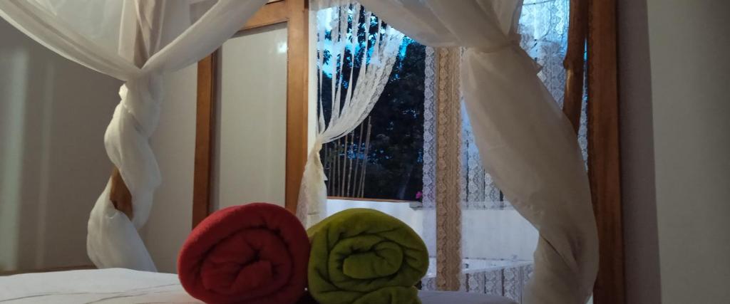 Postel nebo postele na pokoji v ubytování Rustiko Palomino Sierra Nevada