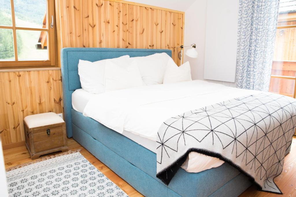 Voodi või voodid majutusasutuse CHALET am Schneeberg See toas