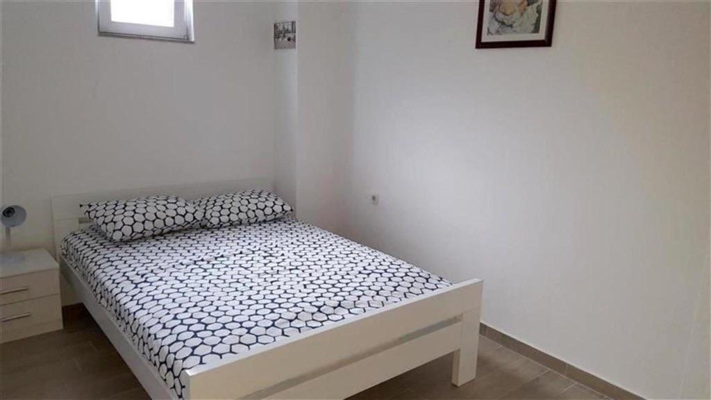 Posteľ alebo postele v izbe v ubytovaní Apartments Ewa