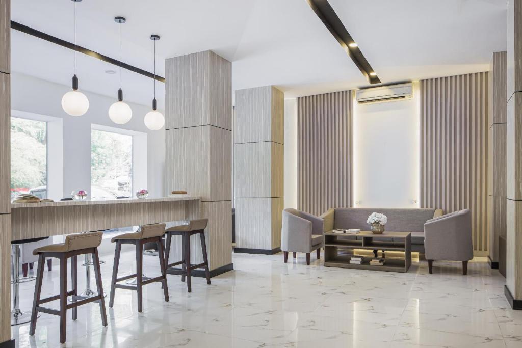 Posezení v ubytování Altos Hotel