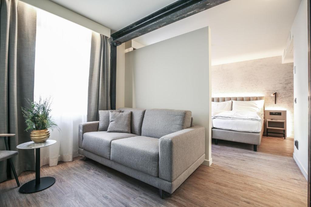 Postel nebo postele na pokoji v ubytování Adaastra Boutique Hotel