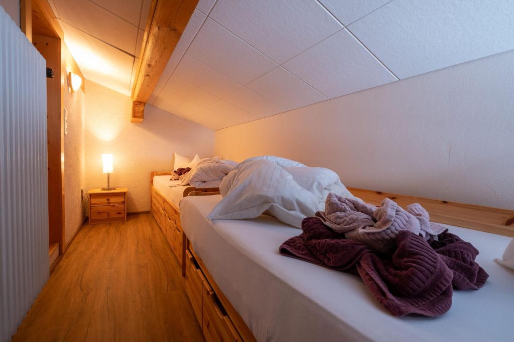 Postel nebo postele na pokoji v ubytování Pension Garni Hochmoos