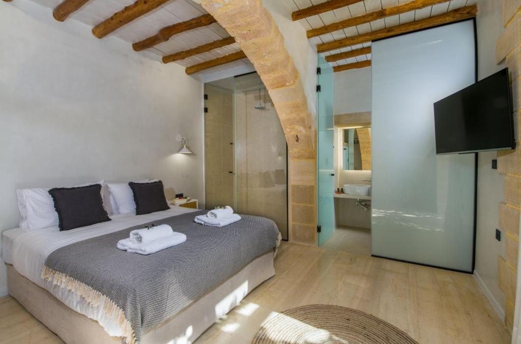 Postel nebo postele na pokoji v ubytování Casa di Grimpili