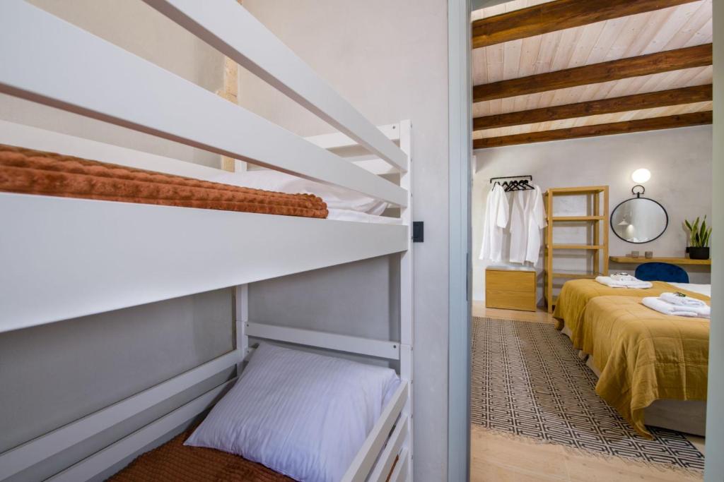 Postel nebo postele na pokoji v ubytování Casa di Grimpili