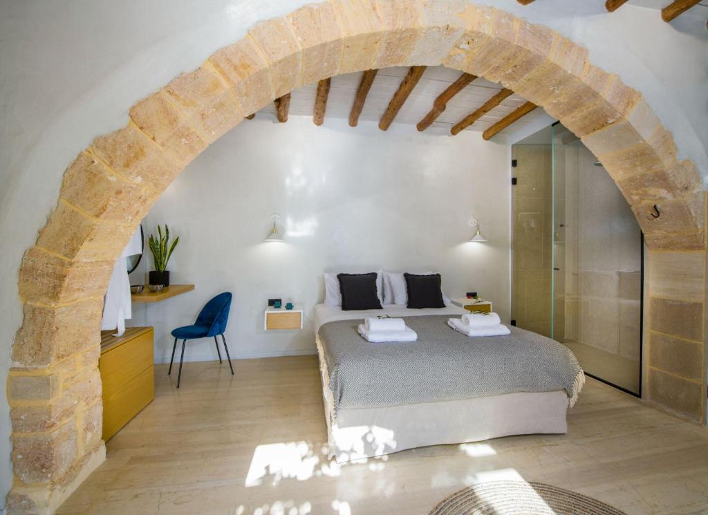 Postel nebo postele na pokoji v ubytování Casa di Grimpili