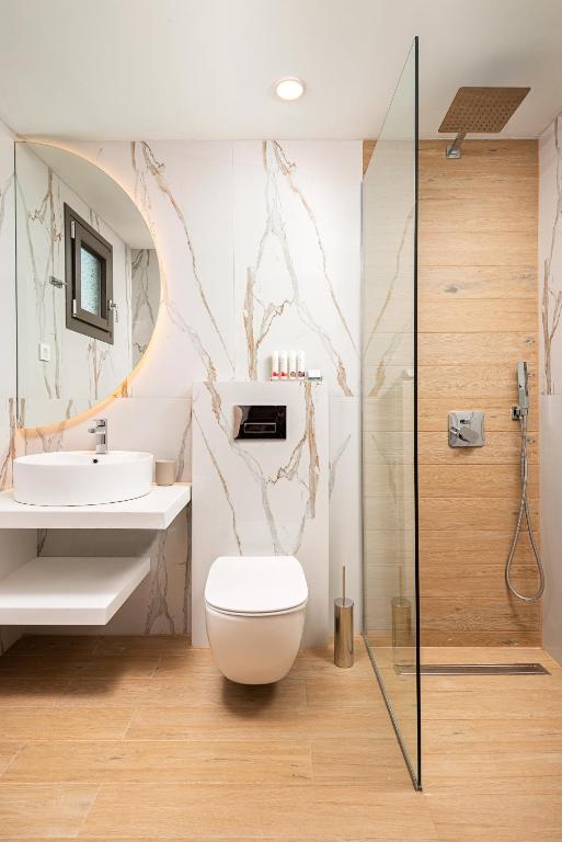 Koupelna v ubytování Urania Hotel