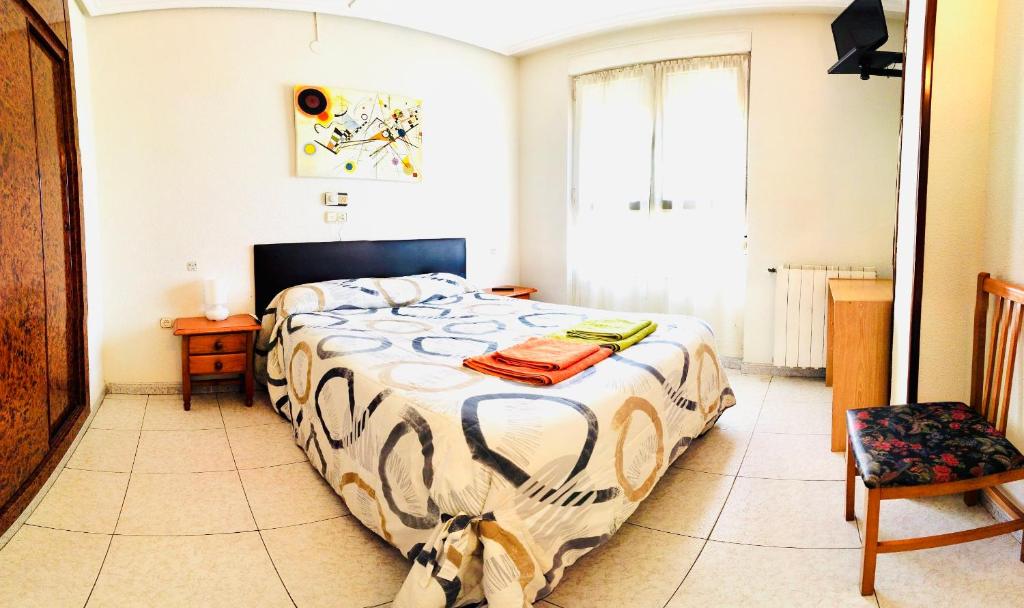 Postel nebo postele na pokoji v ubytování Hostal Sol Naciente