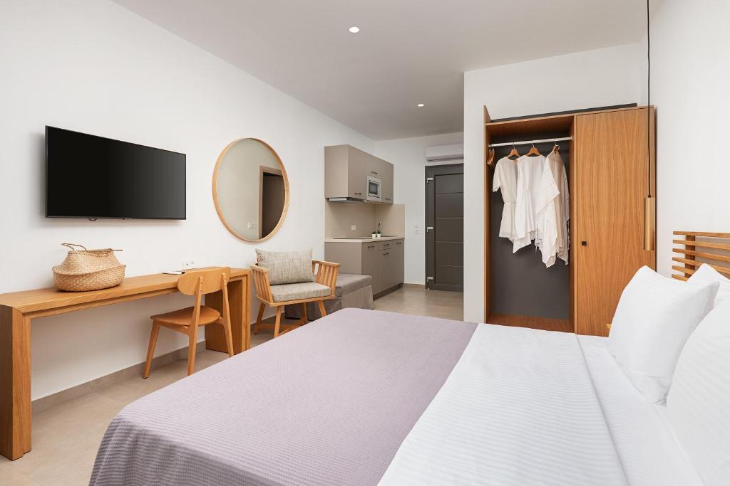 Postel nebo postele na pokoji v ubytování Urania Hotel