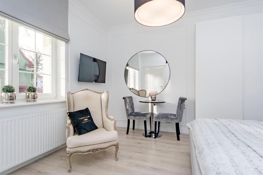 Posteľ alebo postele v izbe v ubytovaní Apartamenty na Uphagena