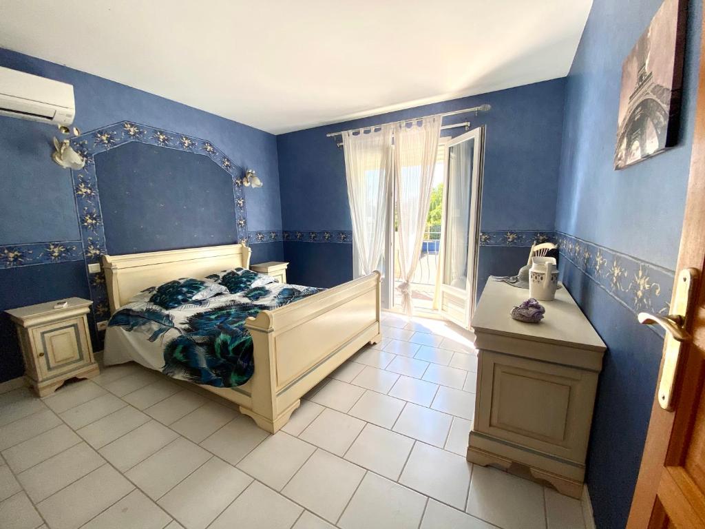 Postel nebo postele na pokoji v ubytování Villa et maisonnette provençales