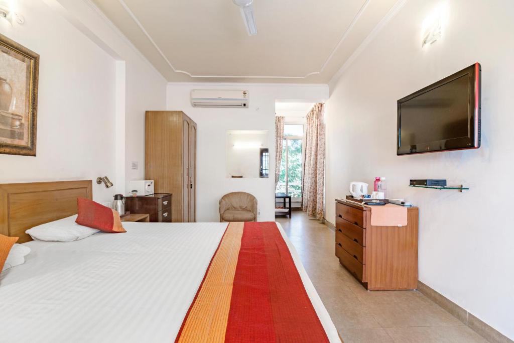Llit o llits en una habitació de Girisadan Boutique Stay