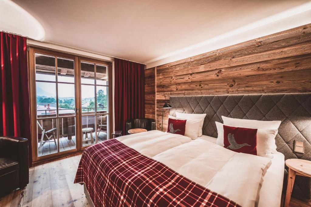 Postel nebo postele na pokoji v ubytování Das Achental Resort