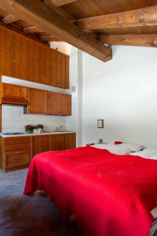 Postel nebo postele na pokoji v ubytování Residence Monterosa