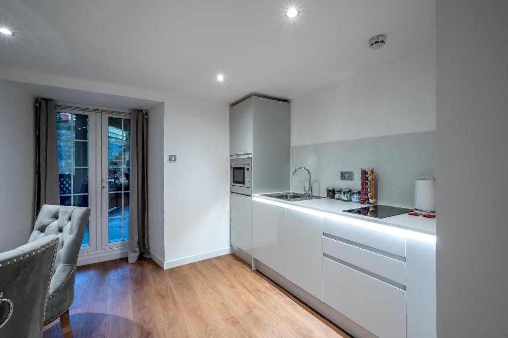 Kuchyň nebo kuchyňský kout v ubytování Casa Fresa - Orchar Suites
