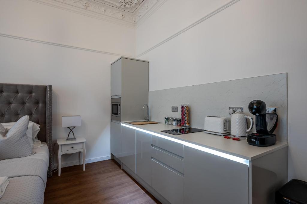Kuchyň nebo kuchyňský kout v ubytování Casa Fresa - Orchar Suites