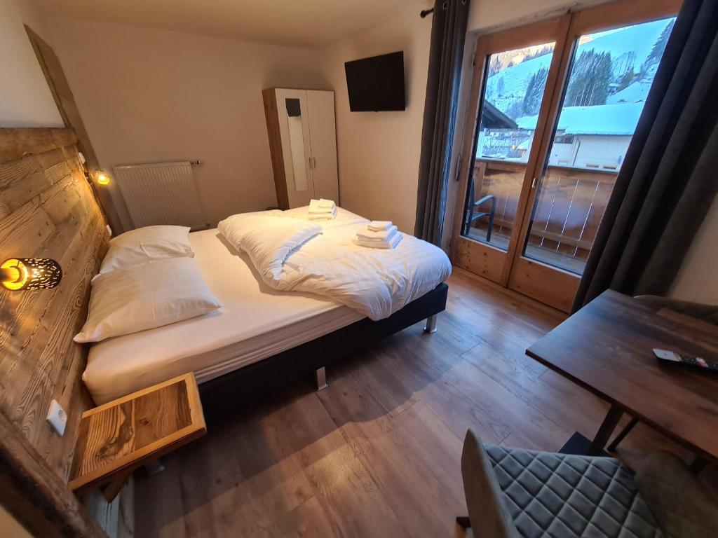 Postel nebo postele na pokoji v ubytování Hotel Pension Annerlhof