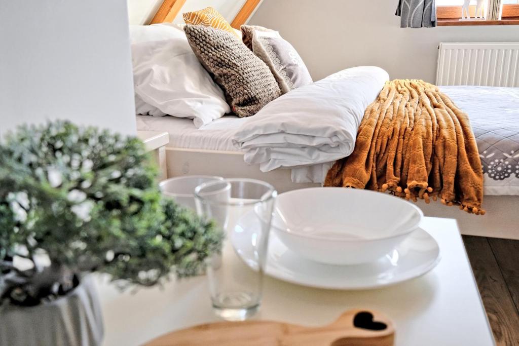 Posteľ alebo postele v izbe v ubytovaní Apartamenty Maciejka Odkryj Zakopane
