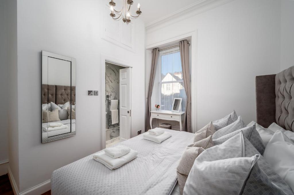 Postel nebo postele na pokoji v ubytování Casa Fresa - Orchar Suites