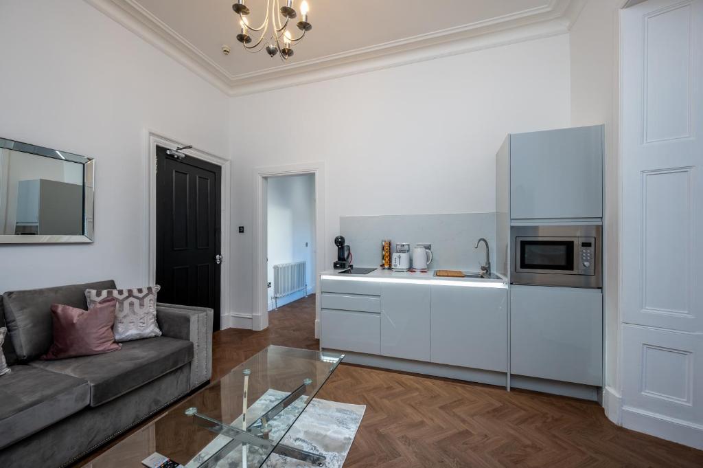Kuchyň nebo kuchyňský kout v ubytování Casa Fresa - Orchar Suites