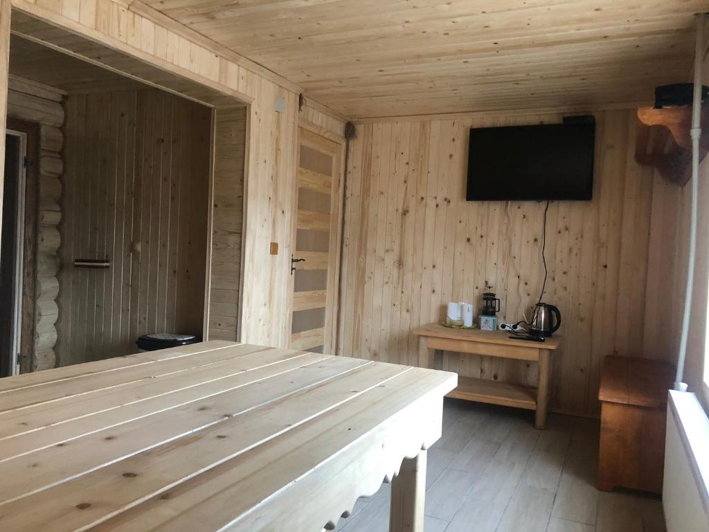 TV a/nebo společenská místnost v ubytování Cottage in Yasinya