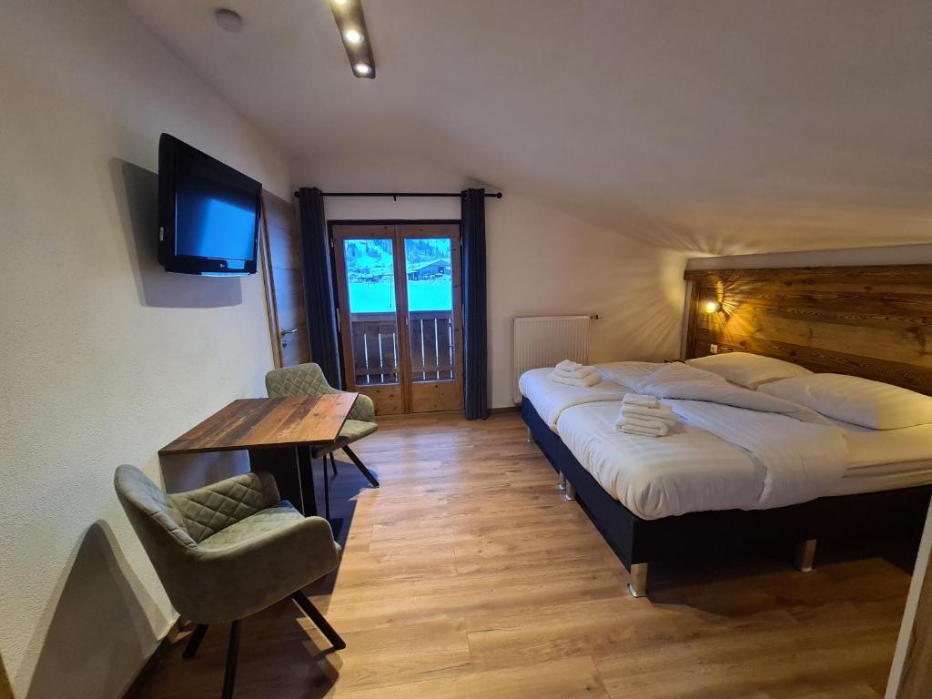 Postel nebo postele na pokoji v ubytování Hotel Pension Annerlhof