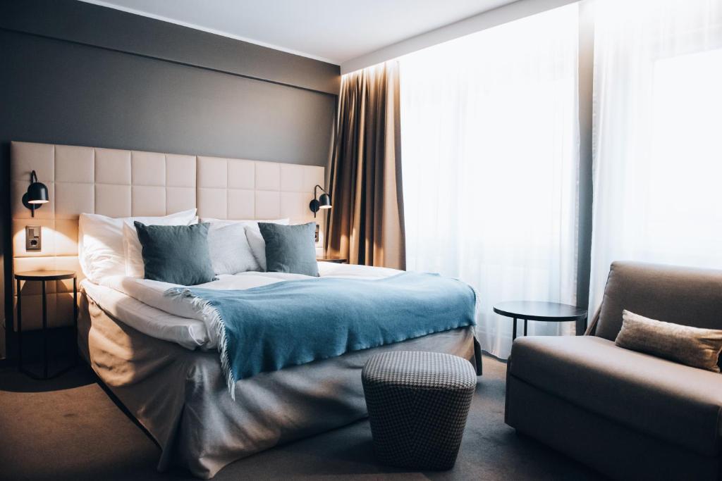 Postel nebo postele na pokoji v ubytování Clarion Hotel Gillet