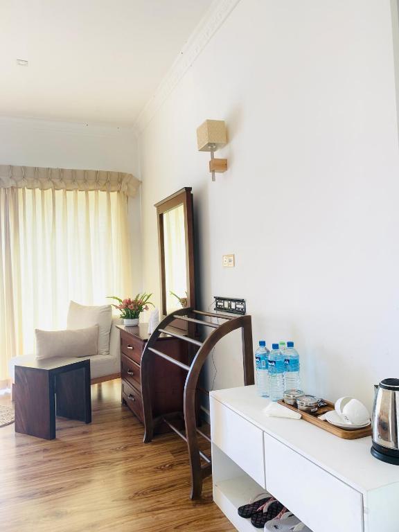 Postel nebo postele na pokoji v ubytování Andora Nuwara Eliya