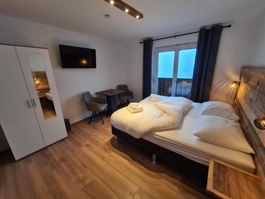 Postel nebo postele na pokoji v ubytování Hotel Pension Annerlhof