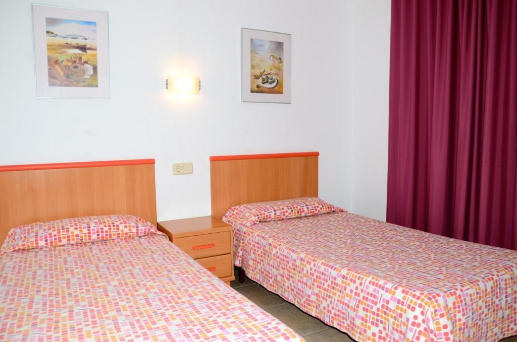 Postel nebo postele na pokoji v ubytování Nautic 1-2