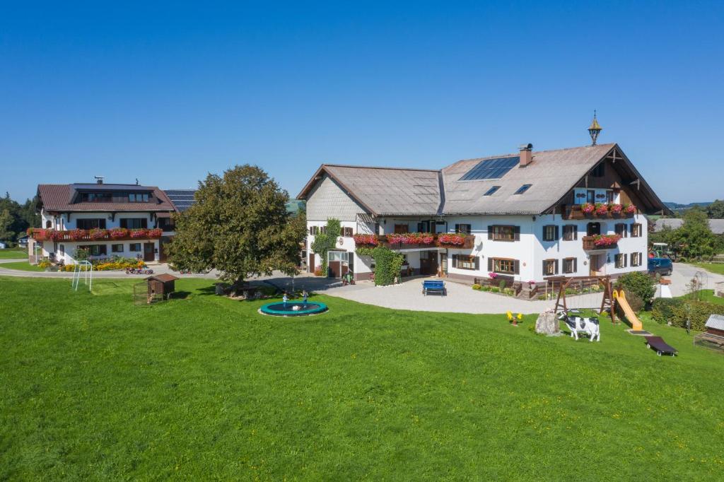 an aerial view of a large house with a park at Bauernhofferien Oberdürnberg in Seekirchen am Wallersee