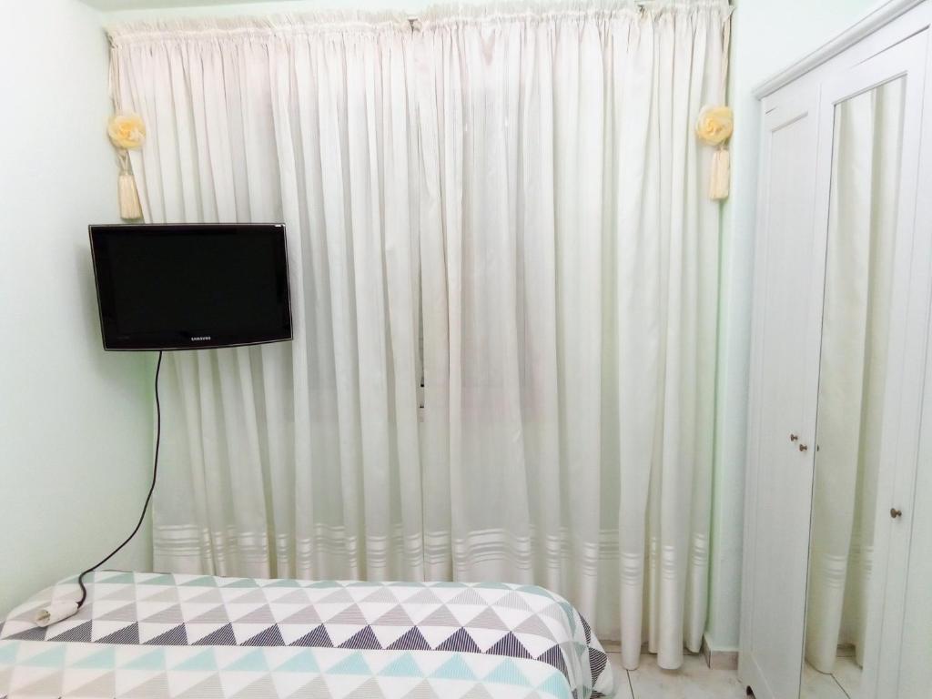 A bed or beds in a room at Nana's philoxenia