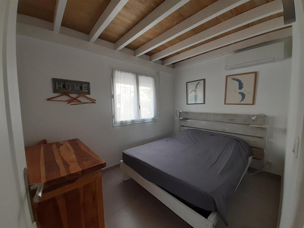 Postel nebo postele na pokoji v ubytování Appartement neuf a 150 metres de la mer wifi