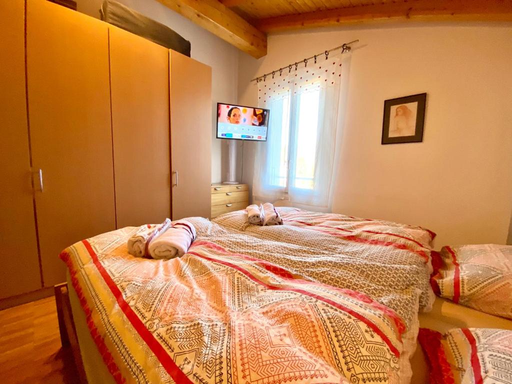 Postel nebo postele na pokoji v ubytování Comano Lugano Ticino - B&B Walterina