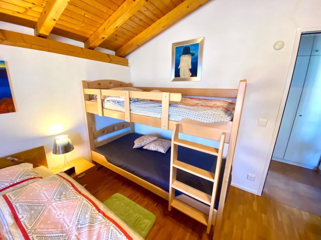 Postel nebo postele na pokoji v ubytování Comano Lugano Ticino - B&B Walterina