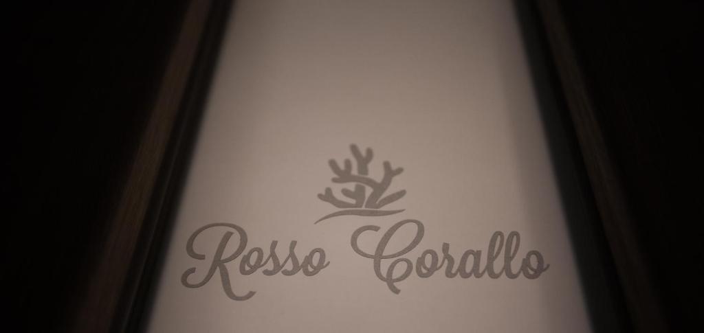 Certyfikat, podpis lub inny dokument wystawiony w obiekcie Rosso Corallo