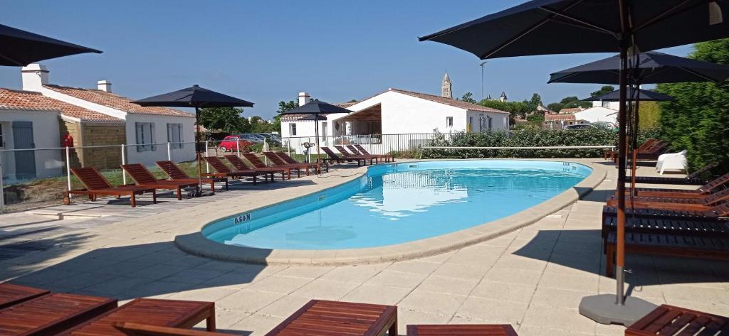 Swimmingpoolen hos eller tæt på Le Parc des Mimosas