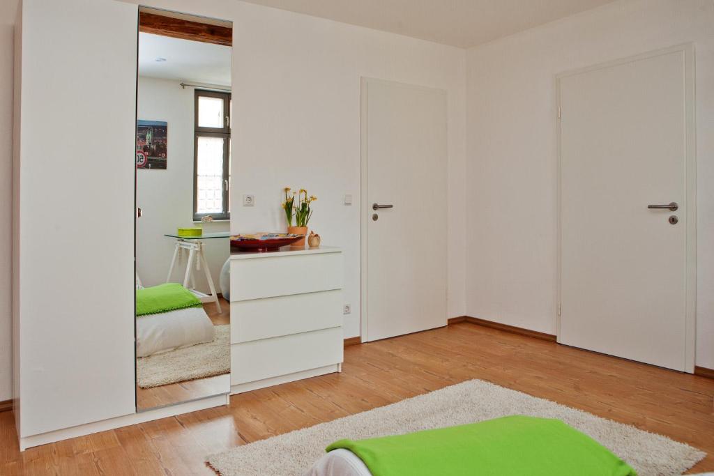 Postel nebo postele na pokoji v ubytování Privatzimmer Othmarsweg