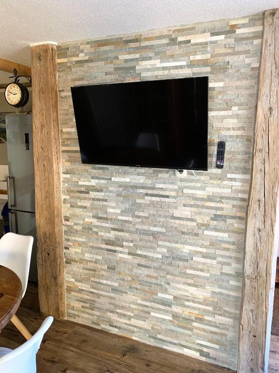 TV a/nebo společenská místnost v ubytování Mountain Apartments
