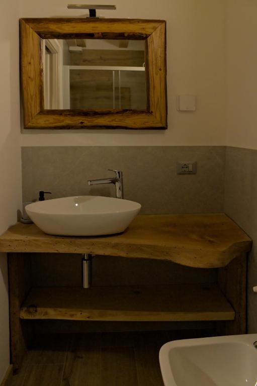 Kúpeľňa v ubytovaní Appartamento Profumo di Legno 022139-AT-010022