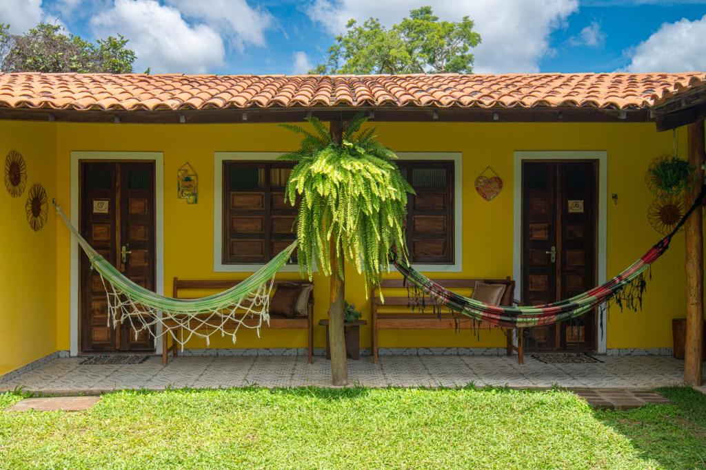 Um jardim em Pousada Aconchego