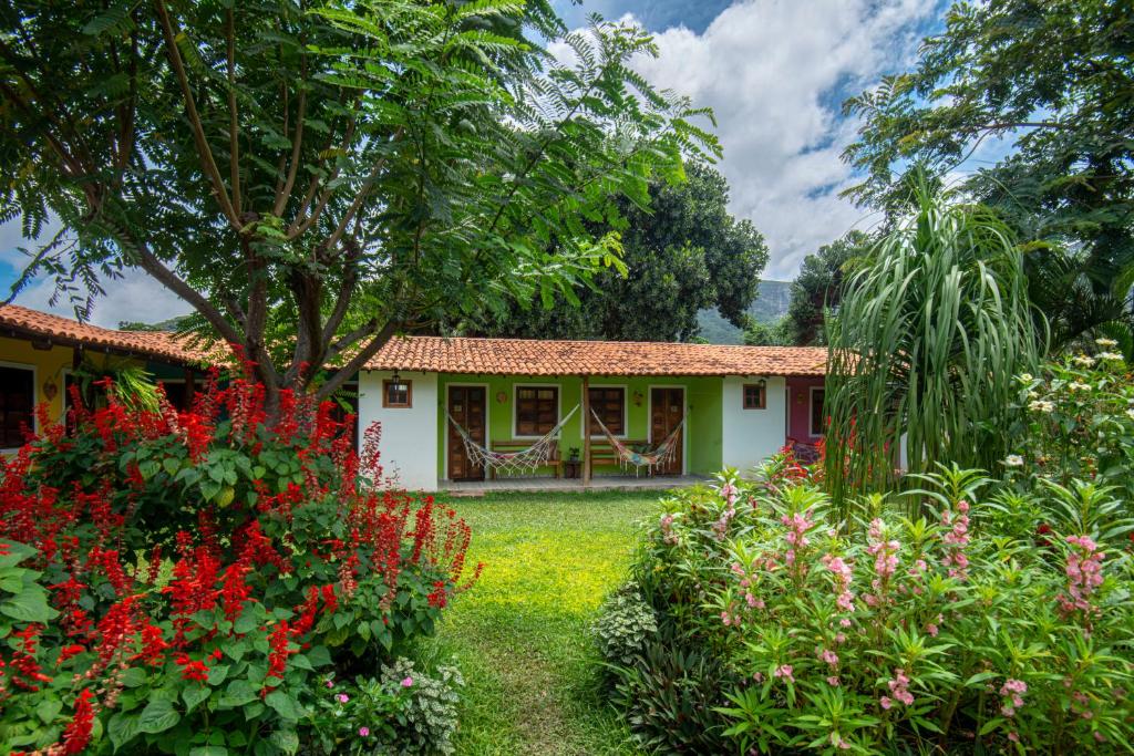 Um jardim em Pousada Aconchego