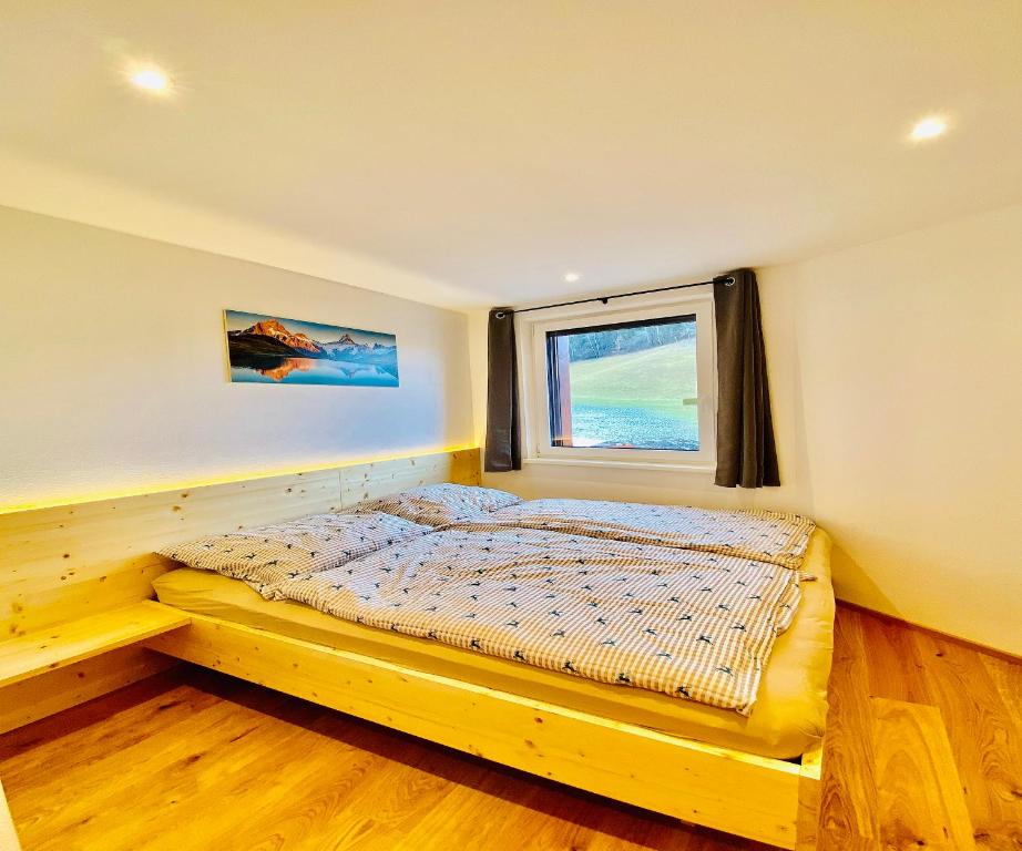 Posteľ alebo postele v izbe v ubytovaní Royal Swan Appartement, Tirol