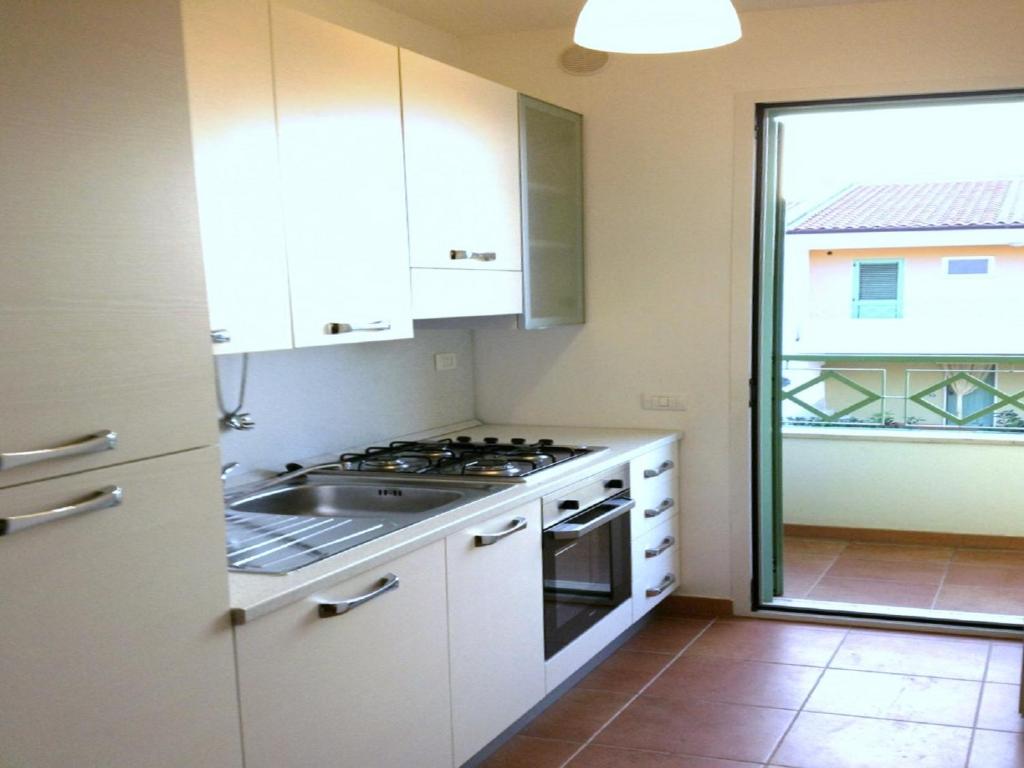 Kuchyň nebo kuchyňský kout v ubytování Pitagora Residence