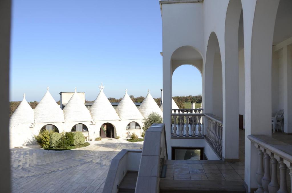 a view from the balcony of a building at Masseria Cappella in Martina Franca